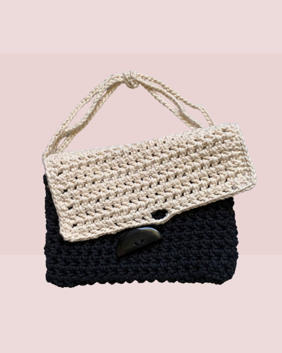 Mia Crocheted Clutch Bag with Handle in Black and Cream and organic button opening